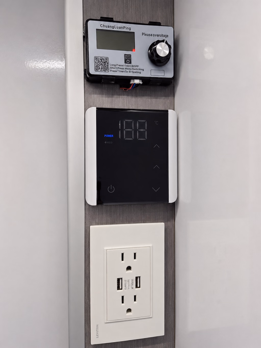 Camper comfort controls with thermostat and electrical outlets