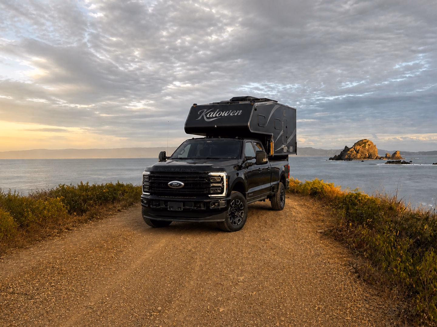 Kalowen 250 Black Panther on a black pickup beside the coast