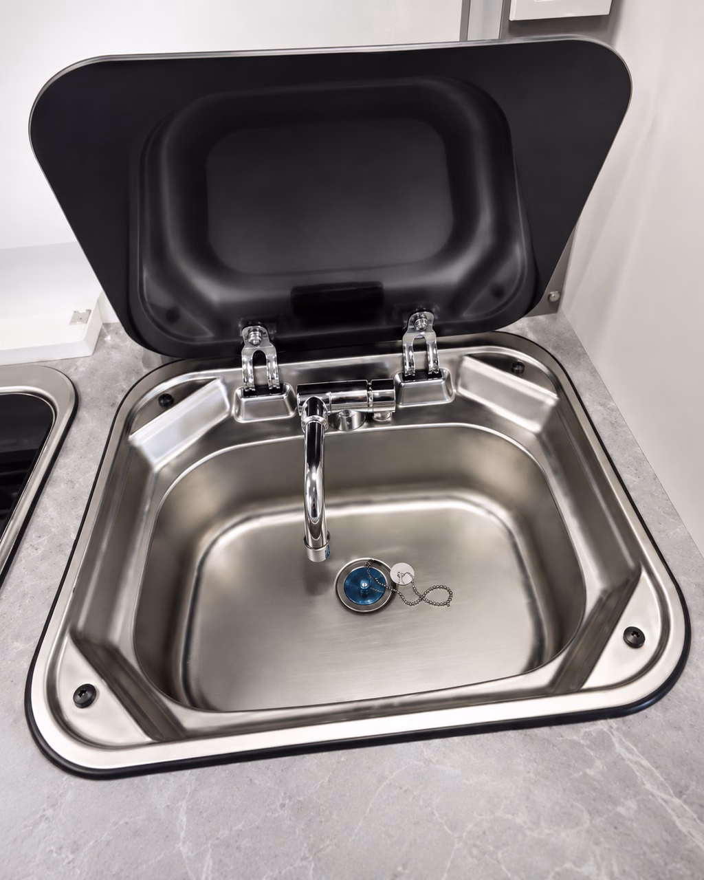 Stainless-steel camper sink with folding faucet and cover